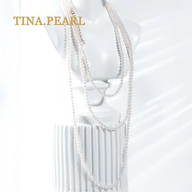 TINA Jewelry Freshwater pearl millet pearl necklace close to round shape extremely shiny pearl size 2.5-3mm can be worn in a variety of ways, the total length of the necklace is 157+3cm . The extension chain is 18 karat gold