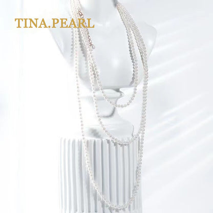 TINA Jewelry Freshwater pearl millet pearl necklace close to round shape extremely shiny pearl size 2.5-3mm can be worn in a variety of ways, the total length of the necklace is 157+3cm . The extension chain is 18 karat gold