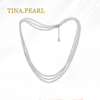 TINA Jewelry Freshwater pearl millet pearl necklace close to round shape extremely shiny pearl size 2.5-3mm can be worn in a variety of ways, the total length of the necklace is 157+3cm . The extension chain is 18 karat gold